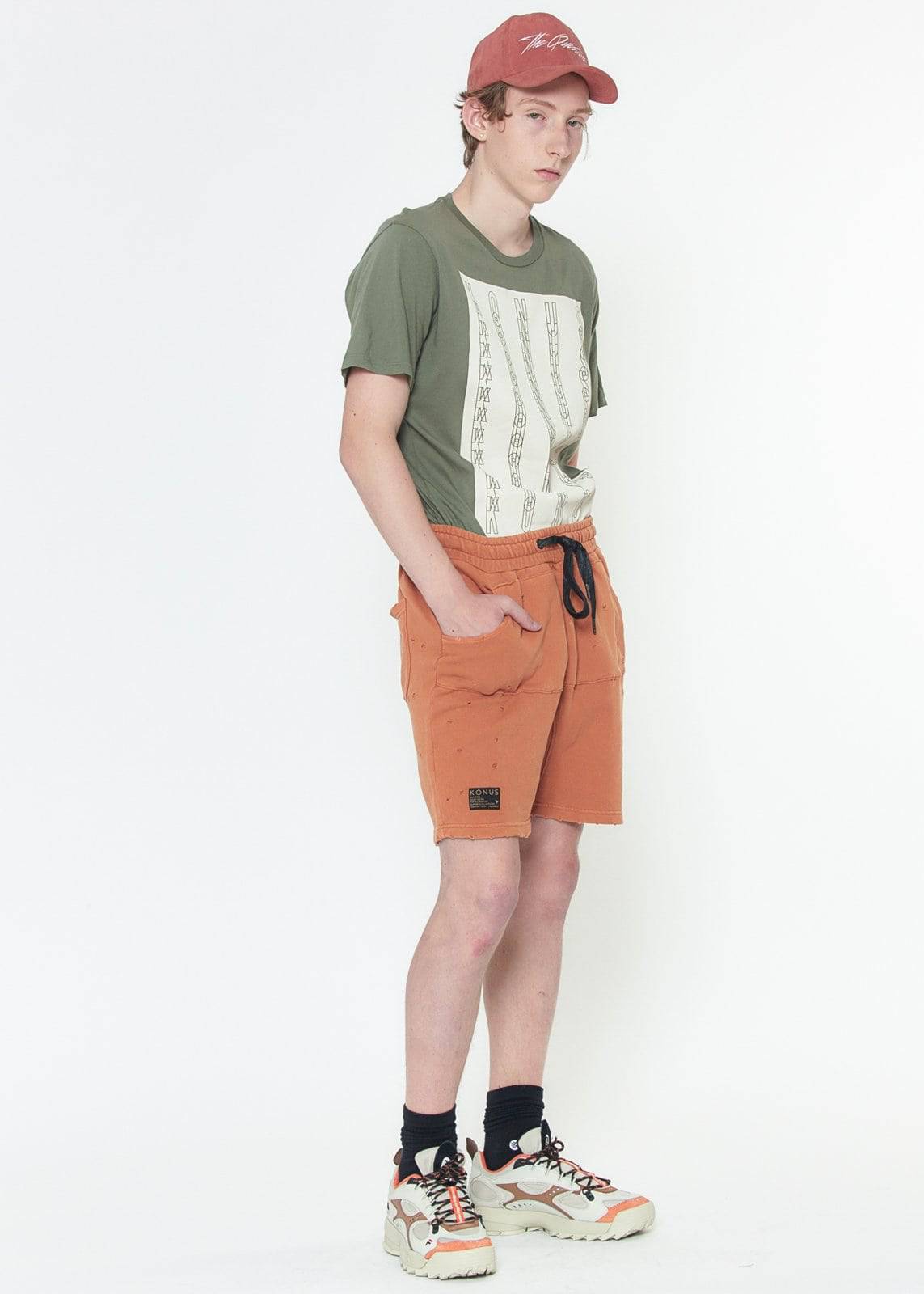 Konus Men's Garment Dyed French Terry Shorts in Orange by Shop at Konus