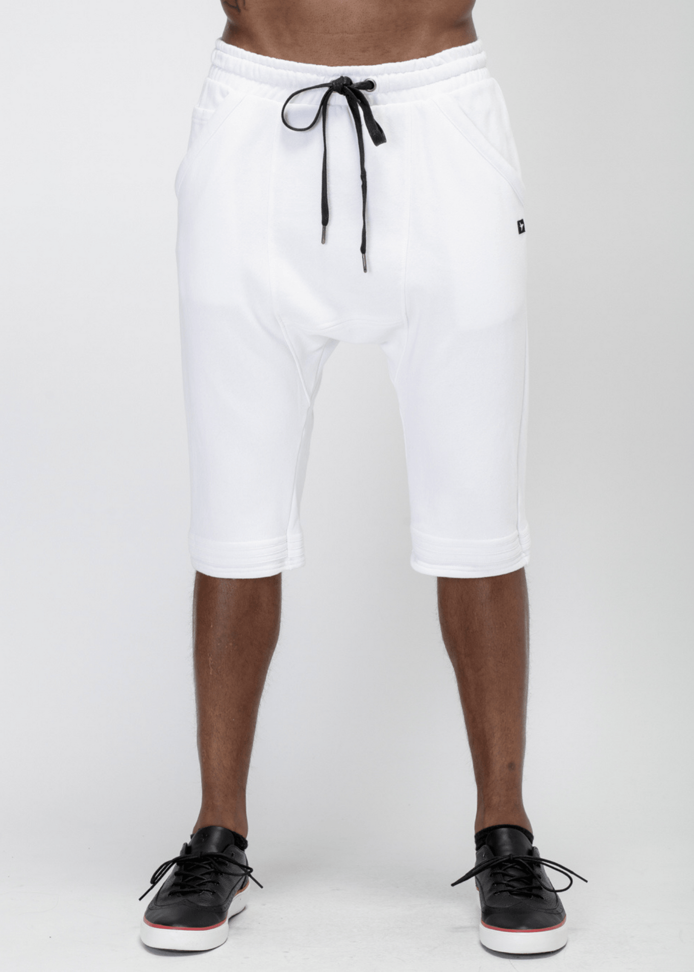 Konus Men's Loose End Shorts in White by Shop at Konus