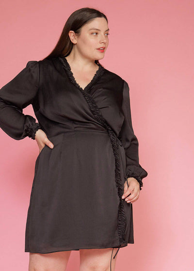 Plus Size Ruffle Trim Long Sleeve Wrap Dress in Black by Shop at Konus