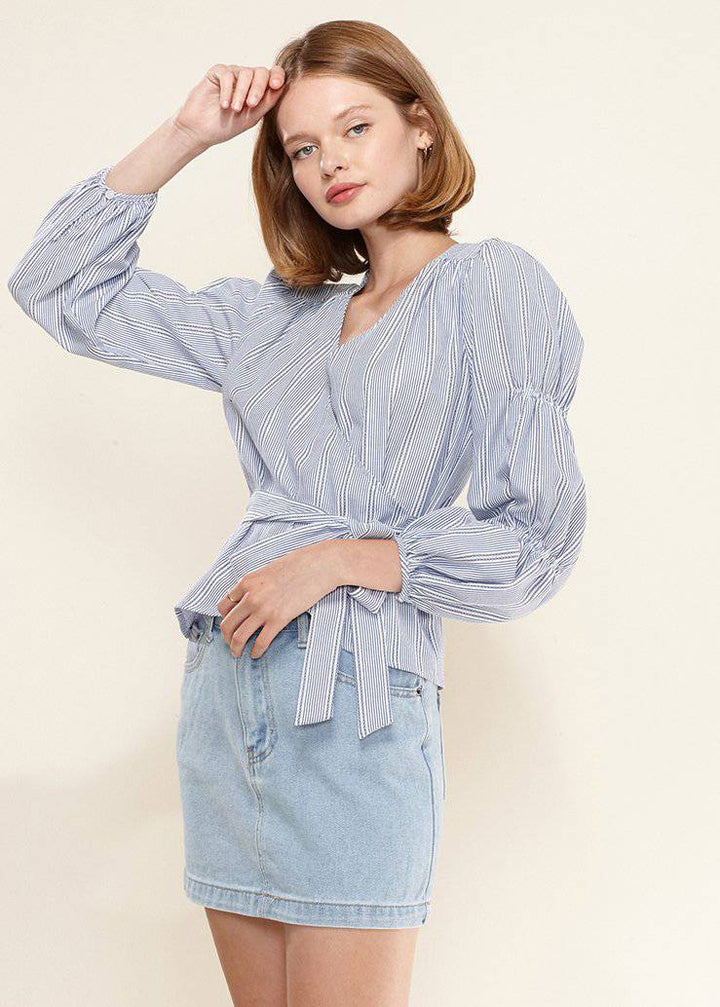 Smocked Sleeve Stripe Wrap Blouse in Blue by Shop at Konus