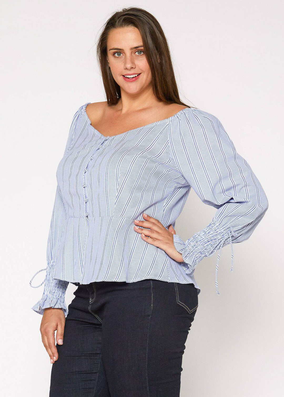 Plus Size Smocked Sleeve Wrap Blouse in Blue by Shop at Konus