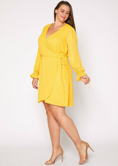 Plus Size Smocked Bell Sleeve Wrap Dress in Yellow by Shop at Konus