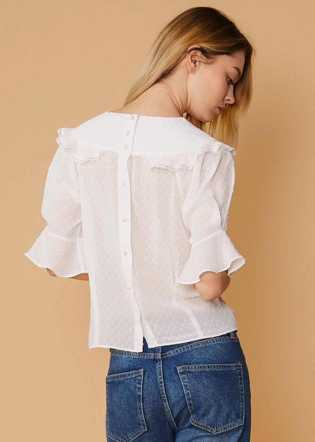 Women's Swiss Dot Ruffle Sleeve Top in White by Shop at Konus