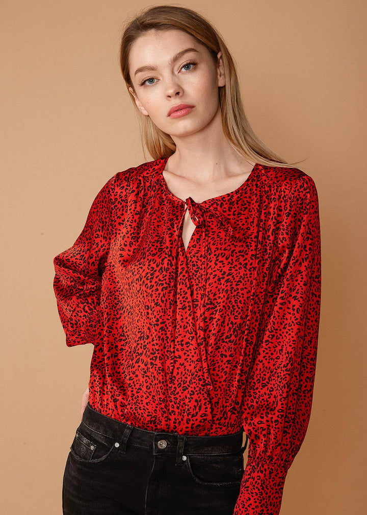 Women's Tie-neck Long Sleeve Bodysuit in Red Leopard by Shop at Konus