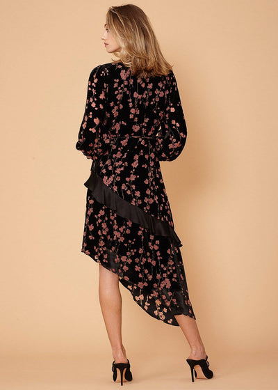 Velvet Asymmetric Wrap Dress in Falling Floral by Shop at Konus