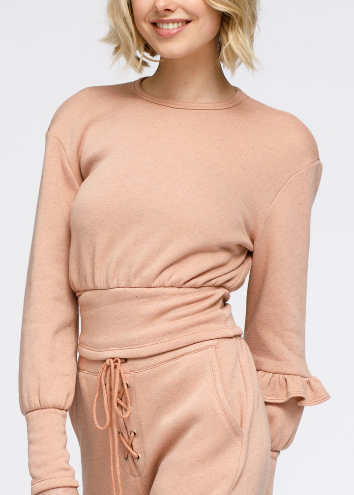 Crewneck Ruffle Sleeve Peplum Sweatshirt In Peach by Shop at Konus